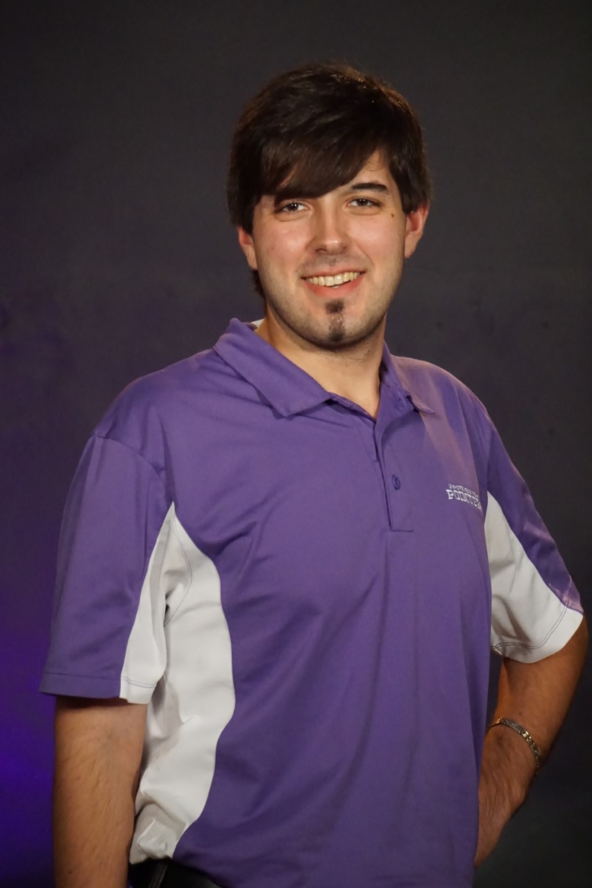 Photo of myself in my University of Wisconsin-Stevens Point shirt.